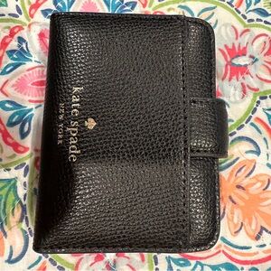 Kate Spade black and tan mini wallet with turn lock clasp